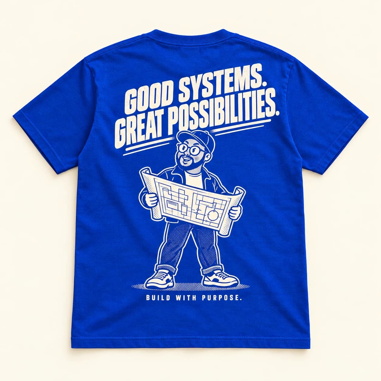 Back of the cobalt tee with the Good Systems blueprint print